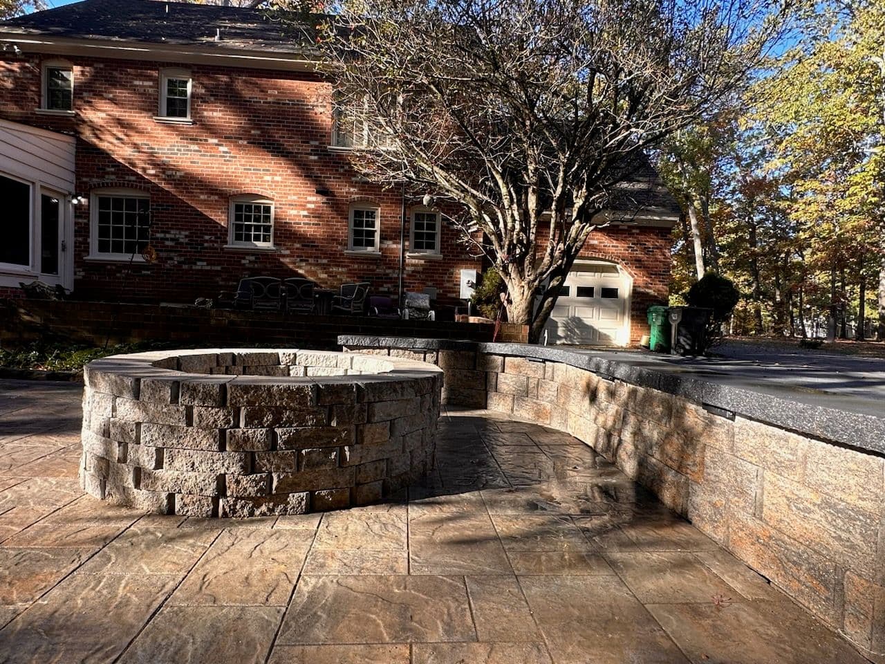 Brick Patio with Stone Fire Pit Transformation image
