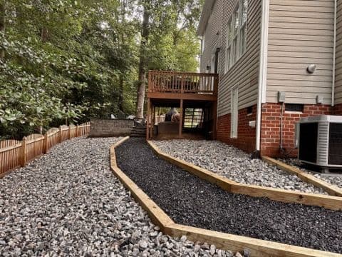 Erosion Control with Rock Landscaping and Chip Stone Walkway image