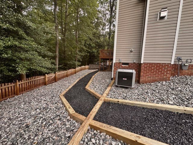 Gallery photos for Erosion Control with Rock Landscaping and Chip Stone Walkway: Image #1