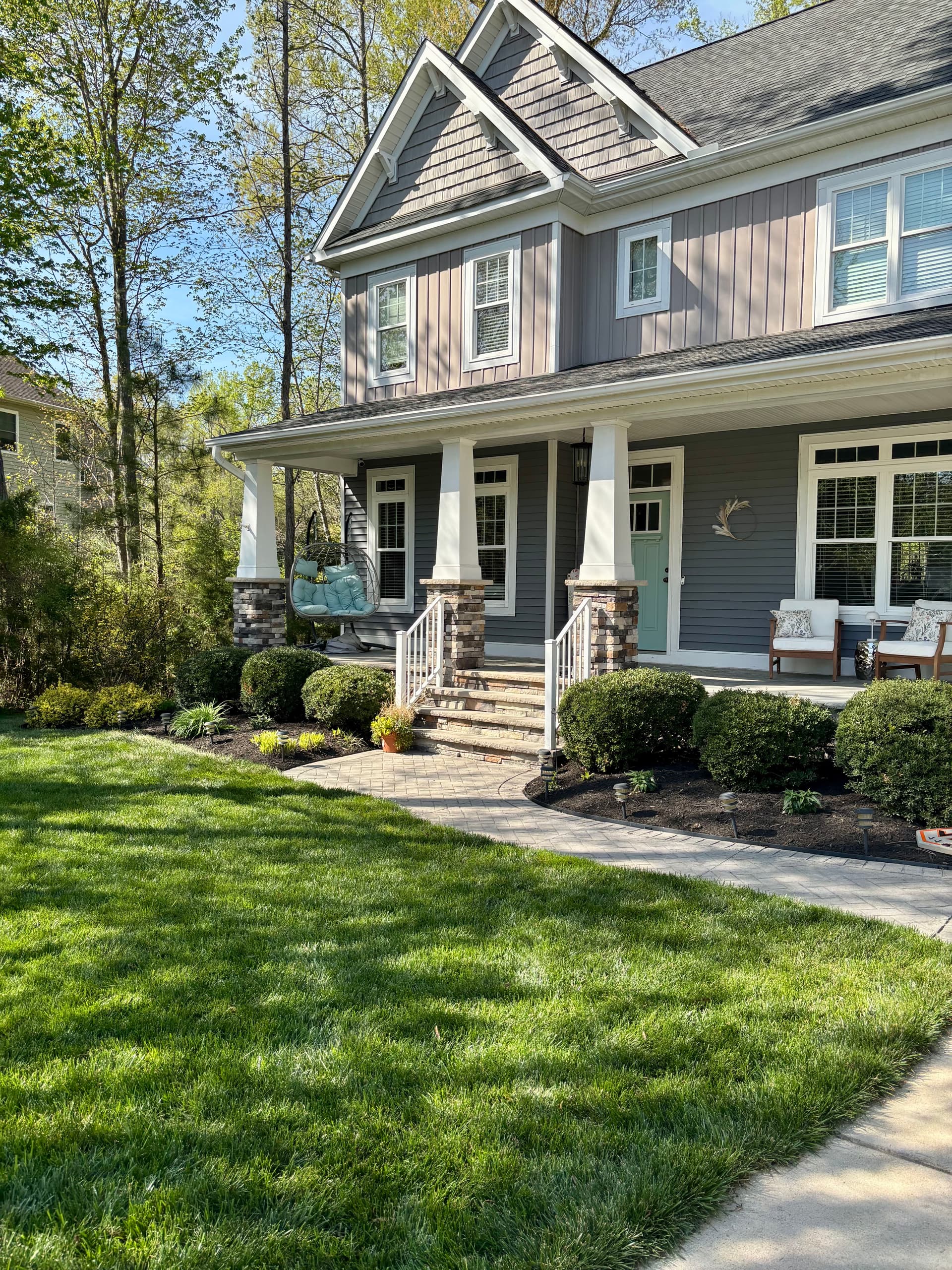 Full-Yard Landscape Makeover with Mulch, Rock, and New Plants image