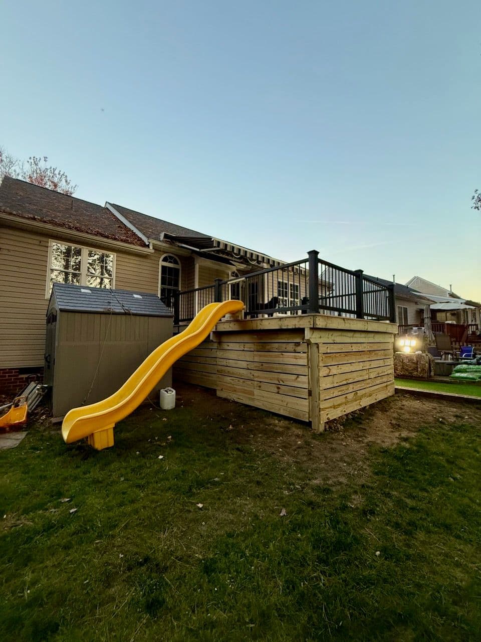 Deck Extension and Playful Slide Installation image